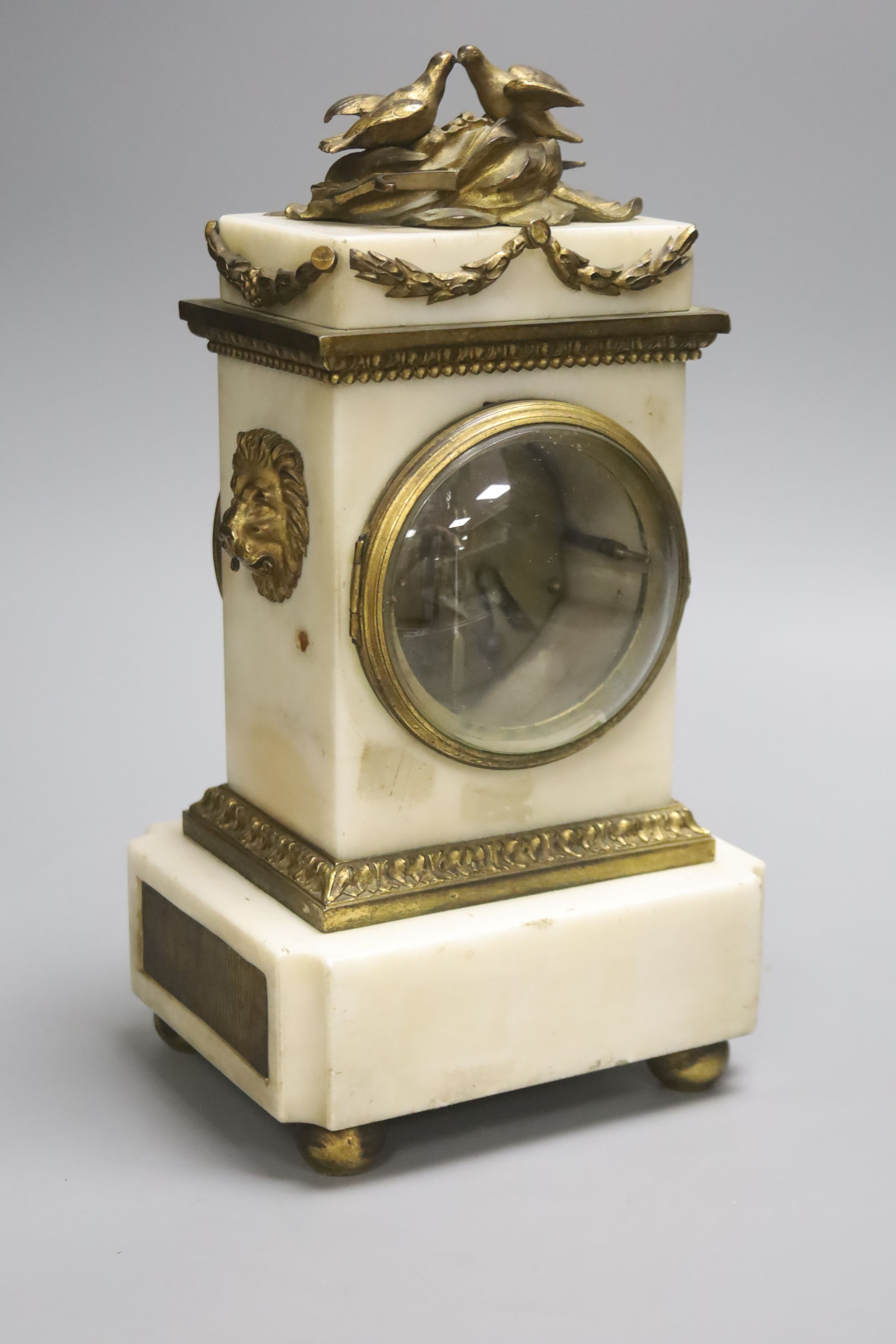 A 19th century bronze and alabaster mantel timepiece, height 28cm